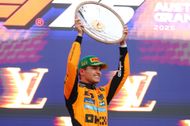 Race winner Lando Norris of Great Britain and McLaren on the podium during the F1 Grand Prix of Australia at Albert Park Grand Prix Circuit on March 16, 2025, in Melbourne, Australia. (Photo by Clive Rose/Getty Images)